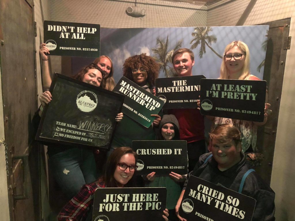 Students at an escape room