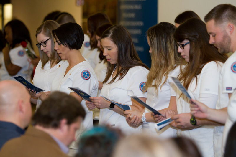 Nursing graduates reciting the Nightingale Pledge