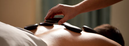 Massage with hot stones