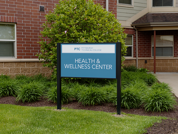 A photo of the sign in front of the wellness center.