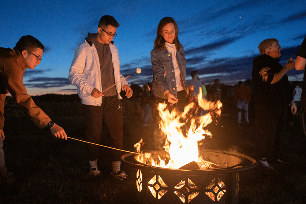 A photo of students enjoying a bonfire at Pittsburgh Technical College.